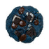 A blue cookie with chunks of Oreo cookies and chocolate chips.