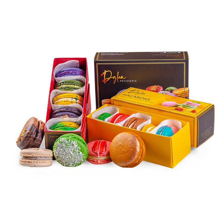 Assorted box of 10 macarons by Dylan Patisserie in yellow and black gift packaging.
